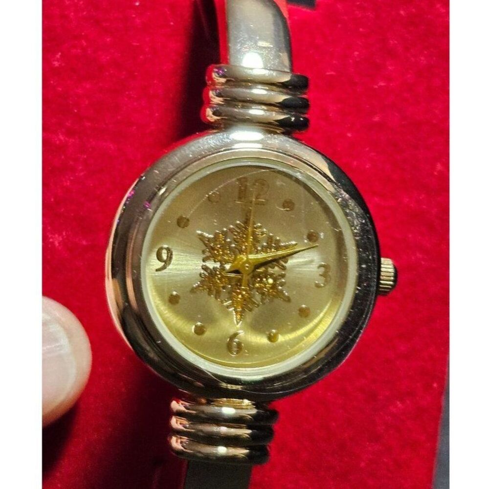 Holiday Lane gold tone snowflake watch